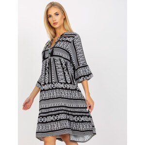 Black patterned dress with ruffle and 3/4 sleeves