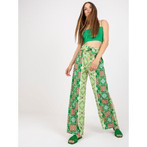 Green patterned fabric trousers with wide legs