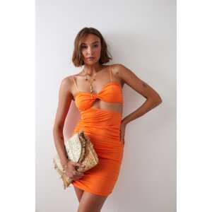 Sensual minidress with neon orange cutout