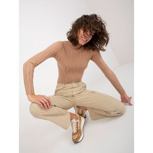 Lady's camel fitted sweater with turtleneck