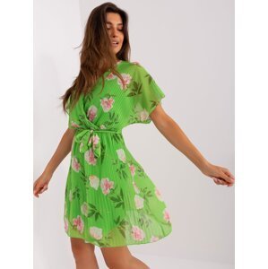 Light green flowing dress with flowers