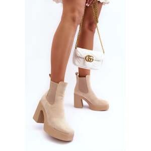 Beige suede ankle boots on a massive high heel by Sunilda