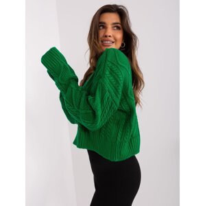 Green loose sweater with cables