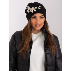 Black and beige knitted beanie with appliqué and rhinestones