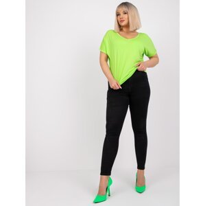 Dina's light green blouse of loose fit