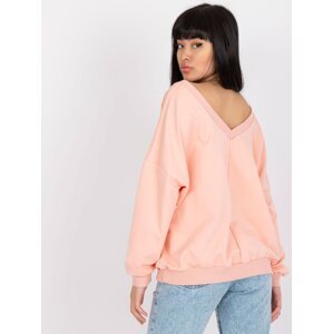 Light pink and black sweatshirt with oversize print