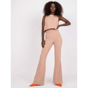 Dusty pink two-piece set with elegant trousers