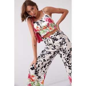 Satin ensemble with floral wide trousers and top in light beige and black