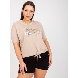 Beige blouse of larger size with print and application