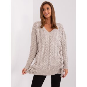 Beige women's sweater with cables