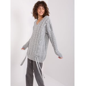 Grey women's sweater with cables