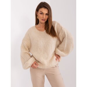 Light beige knitted sweater with wide sleeves