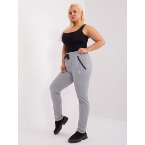 Grey melange trousers in a larger size with patch