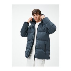Nafukovací kabát Koton s kapucňou, vrecko detailné so zipsom.