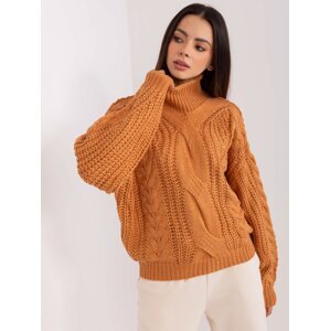 Light brown women's oversize sweater with cables