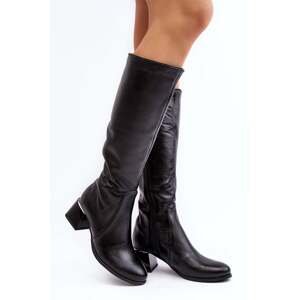 Black low-heeled leather boots by Cersaina