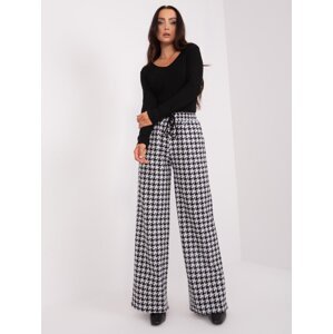 Black and white patterned fabric trousers