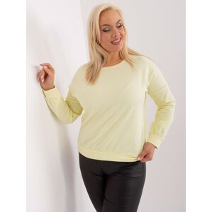 Light yellow plus size blouse with a round neckline