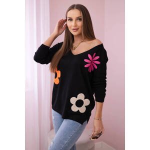 Sweater blouse with a floral pattern in black color