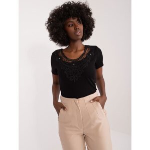 Black blouse with lace and appliqué