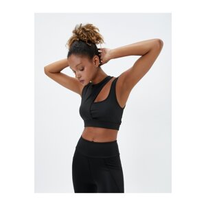 Koton Sports Bra. Padded, Non-wired Sports Bra with Window Detail in the Back and Straps.