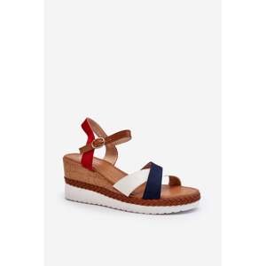 White and navy blue Kioda wedge sandals with straps