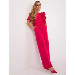 Fuchsia women's trousers made of creased fabric