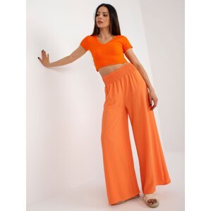 Light orange high-waisted Swedish trousers