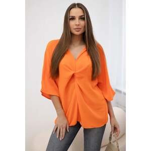 Oversized blouse with an orange neckline