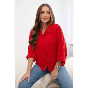 Oversized blouse with red button fastening