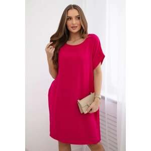 Dress with fuchsia-colored pockets