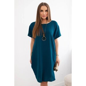 Dress with pockets and a navy pendant