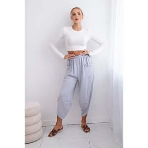 Grey trousers with wide legs and pockets