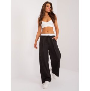 Black wide trousers with a contrasting belt