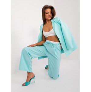 Mint fabric trousers with white belt
