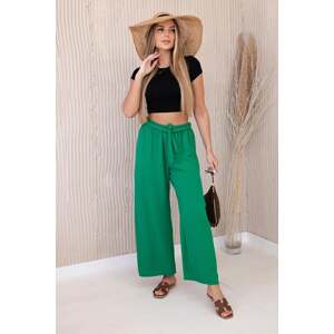 Wide-waisted trousers in green colour