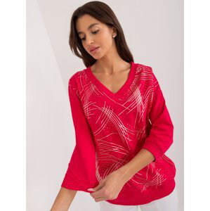Red women's blouse with a glossy print