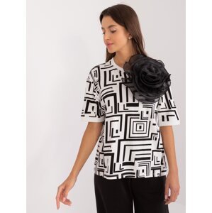 Ecru women's blouse with decorative floral brooch