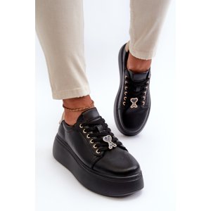 Women's leather sneakers on a black Vinceza platform