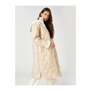 Koton dlhý nafukovací kabát plyšový detail, kapucňa na zips, vrecká.