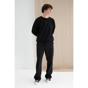 Trendyol Black Men's More Sustainable Oversize Sweatpants with Pocket, Textured Fabric Detail.