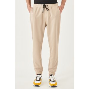 AC&Co / Altınyıldız Classics Men's Beige Standard Fit Normal Cut, Elastic Waist And Legs. Comfortable Sports Sweatpants.