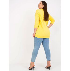 Yellow long blouse of larger size with pocket