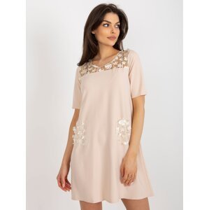 Beige cocktail dress with floral application