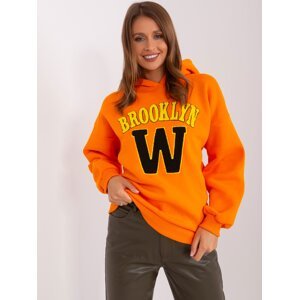 Orange hoodie with patch