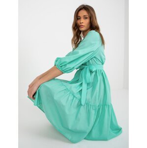 Mint flowing dress with ruffle and belt