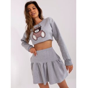 Grey miniskirt with frills and pockets