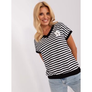 Black and white striped blouse with flower