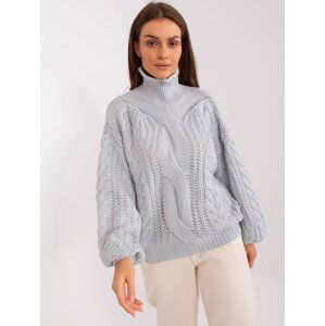 Grey women's oversize sweater with turtleneck
