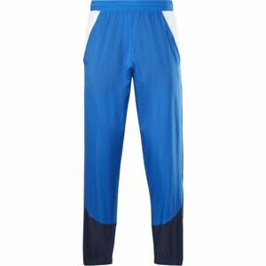 Reebok TRAIN WOVEN PANT Pánske šuštiakové nohavice, modrá, veľkosť XL
